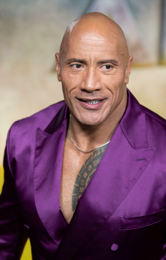 Tumma ihonsävy ja komeasti hoidettu kroppa - siitä Dwayne 'The Rockin' ilmiasu on tehty.