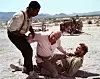 Ossie Davis, Telly Savalas ja Burt Lancaster tähdittävät lännenkomediaa Päänahanmetsästäjät.