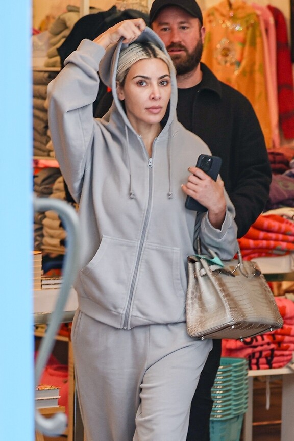 Kim ei innostunut paparazzin nähdessään.
