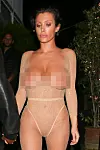 Verkosta tehdyn fishnet bodysuitin suola ovat kauniit ja kimmeltävät timangit.