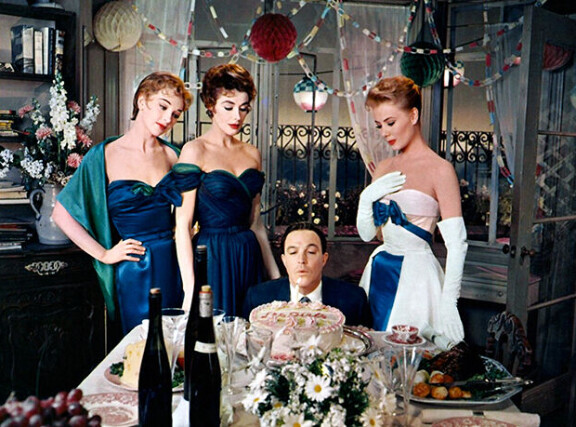 Tytöt oli Taina Elgin tunnetuin elokuva. Kuvassa leffan tähtinelikko Taina Elg, Kay Kendall, Gene Kelly ja Mitzi Gaynor.