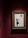 Girl With Balloon on Banksyn tunnetuimpia töitä. Aiheesta tehty taulu aiheutti kuohuntaa, kun se myytiin 1,2 miljoonalla eurolla huutokaupassa vuonna 2018. Hetkeä myöhemmin sen alaosa silpoontui, kun automaattinen silppuri käynnistyi teoksen sisällä. Maalauksen nimeksi tuli Love is in the Bin ja se myytiin myöhemmin vielä kalliimmalla.