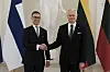 Myös Alexia isännöinyt Liettuan presidentti Gitanas Nauseda nähdään pallottelemassa Alexin videolla.