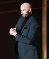 Travolta oli julkisuudessa kaljuna vuonna 2023.
