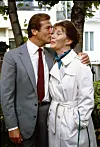 Sir Roger Moore and Lois Maxwell.