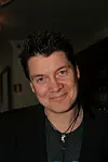 Geir Rönning hymyilee.