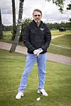 Mika kuvattuna golfin parissa 2022.