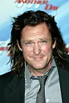 Michael Madsen elokuvan 007 – kuolema saa odottaa ensi-illassa vuonna 2002.