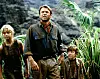 Sam Neill (keskellä) elokuvassa Jurassic Park (1993).