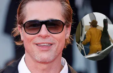 Salakuvat! Sadekuuron yllättämä Brad Pitt kapusi tyylikkäänä koneeseen - huomasitko tämän yksityiskohdan?