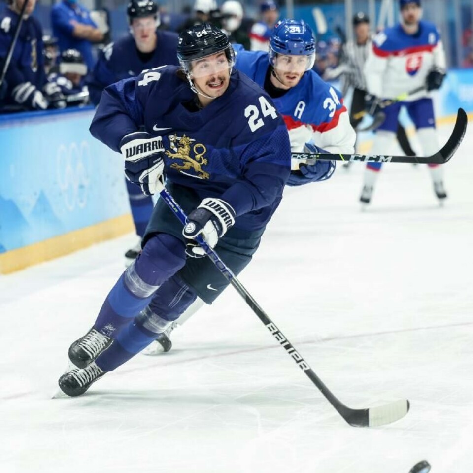 NHL-miljonääri Olli Jokinen haluaa tuoda kiekkokeskusteluissa lisää persoonia esiin. Kuvassa Suomen ensimmäisen olympiakullan ratkaissut lahtelainen viiksimies Hannes Björninen.