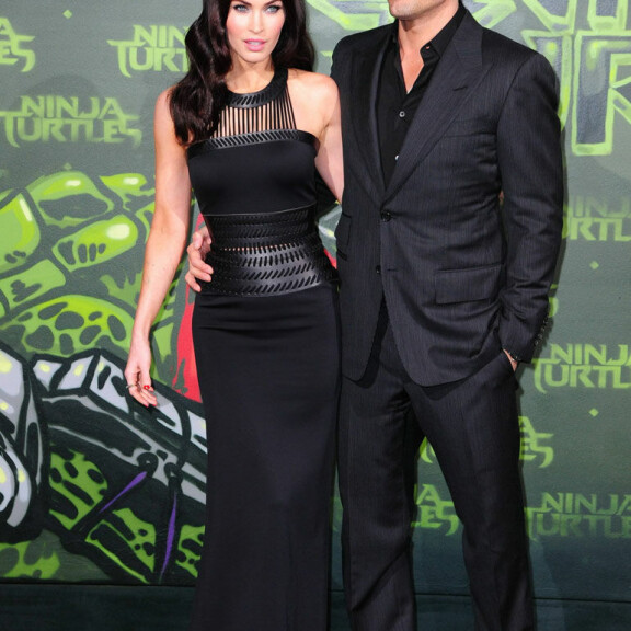 Megan ja Brian Turtlesit-elokuvan ensi-illassa Berliinissä vuonna 2014. Megan Fox und Ehemann Brian Austin Green bei der Premiere Teenage Mutant NINJA TURTLES in den UFO Sound Studios in der Musikbrauerei in Berlin am 05.10.2014,