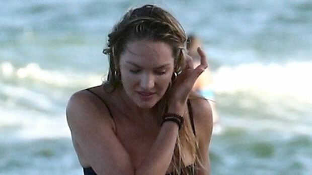 Jestas, mikä bikinikroppa ja stringipeppu! Supermalli Candice Swanepoel esitteli vartaloaan märkänä rannalla – katso kuvat! Candice Swanepoel