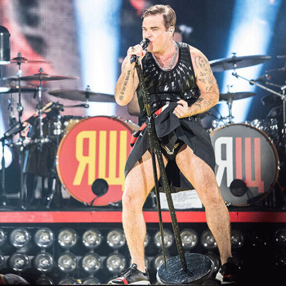 Robbie Williams joutui viikoksi teho-osastolle: muutoksia aivoissa, käsi puutui ja kuola valui - veti silti keikan karmivassa kunnossa! robbie Williams